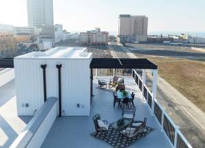 Sun deck on top of the Residences at Orange Loop with water views.