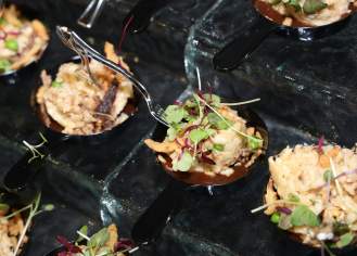 Chef prepared small bites neatly presented on ice at the Captain's Table event at the Discover Atlantic City Boat Show.