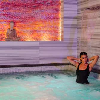 Woman bathing at Exhale Spa at Ocean Casino Resort in Atlantic City, NJ.