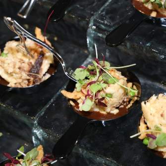 Chef prepared small bites neatly presented on ice at the Captain's Table event at the Discover Atlantic City Boat Show.