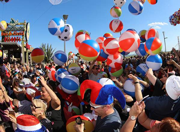 Crowds gather on the Boardwalk near Resorts Casino Hotel and Landshark Bar & Grill for the annual Memorial Day Beach Ball Drop.