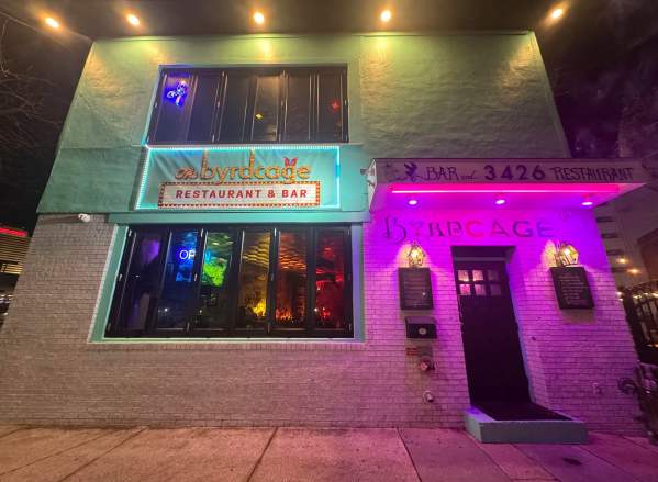 Byrdcage Restaurant and Bar in Atlantic City's Chelsea section. Exterior entrance with tinted rainbow windows.