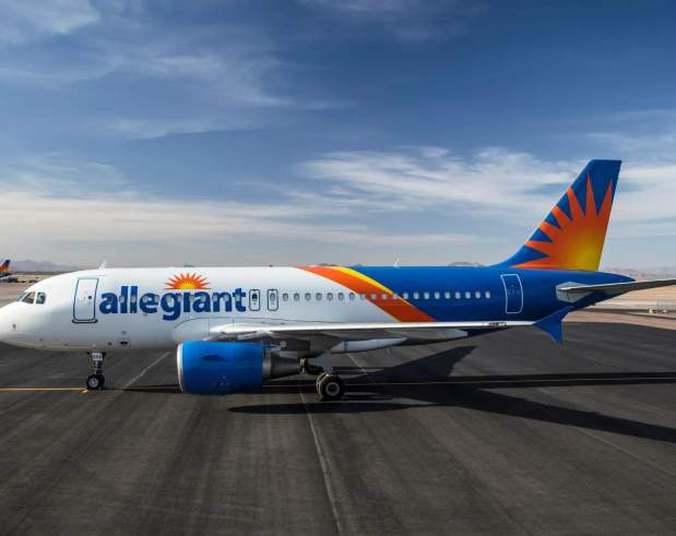 Allegiant air plane on runway.