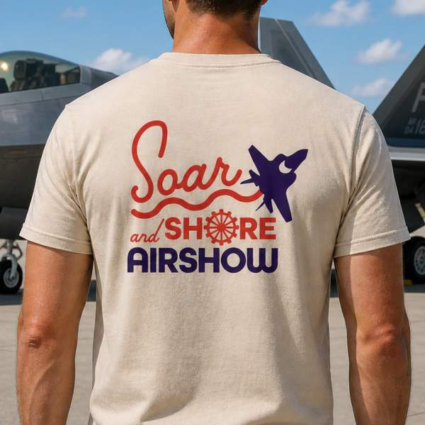 A person models the branded Atlantic City Soar & Shore Airshow t-shirt.