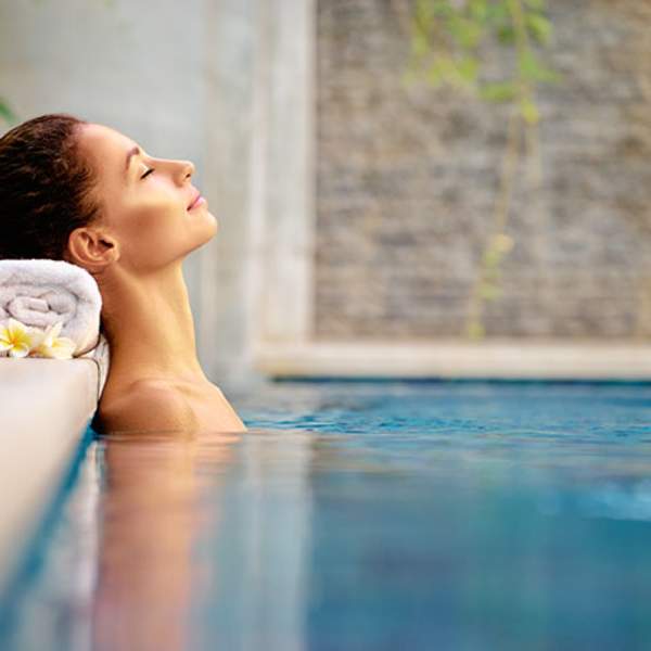 woman relaxing in a spa pool