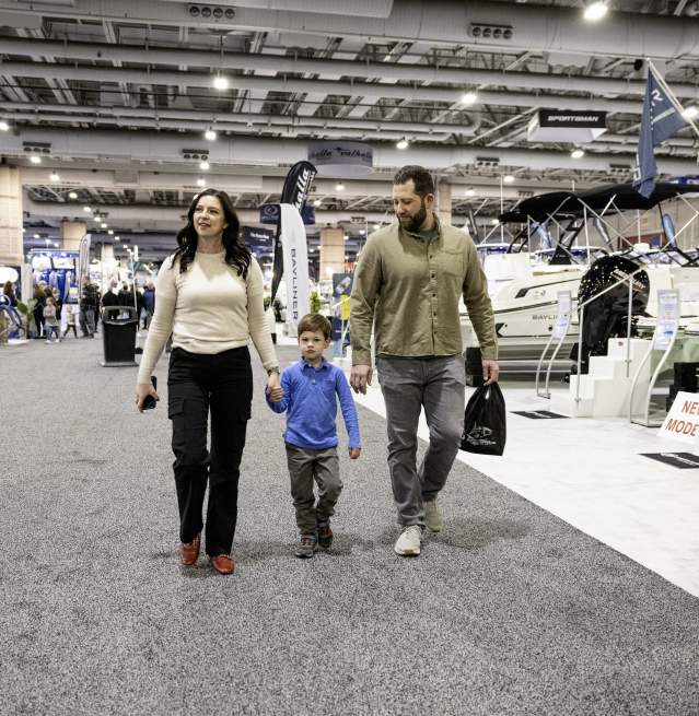 Family of three enjoys browsing at the Atlantic City Convention Center during the Discover Boating Atlantic City Boat Show.