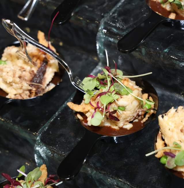 Chef prepared small bites neatly presented on ice at the Captain's Table event at the Discover Atlantic City Boat Show.