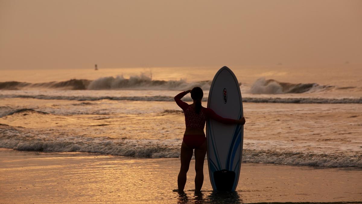Surfer Looking out at Ocean