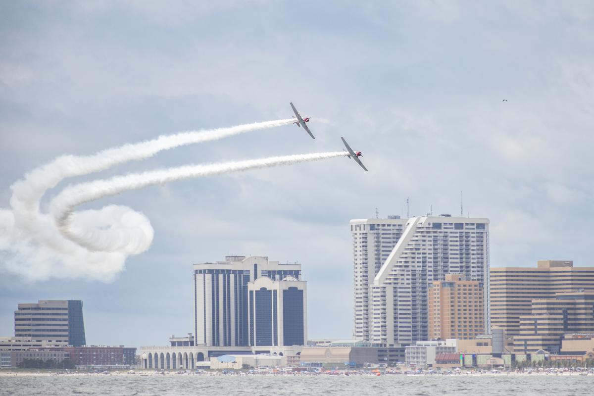 Planes performing aerobatic maneuvers over Atlantic City during the Soar & Shore Airshow