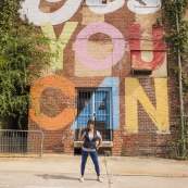 Women at Yes You Can Mural in Downtown
