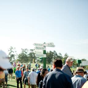 Crowd by Directional Sign | Masters