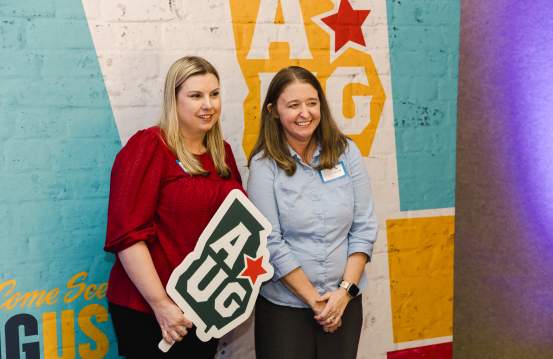 Ladies in Photobooth at Augusta State of Tourism