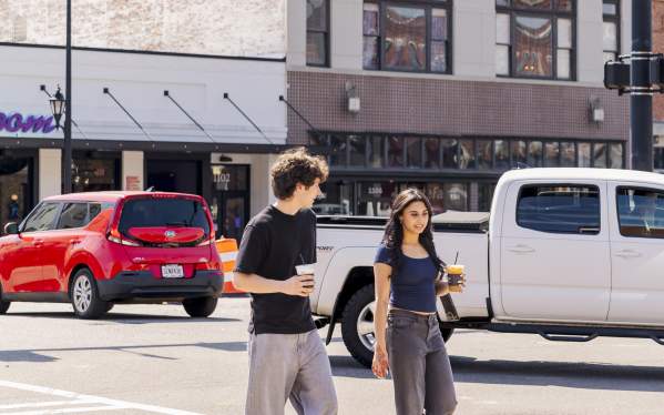 Young Adults Walking Across Downtown Augusta