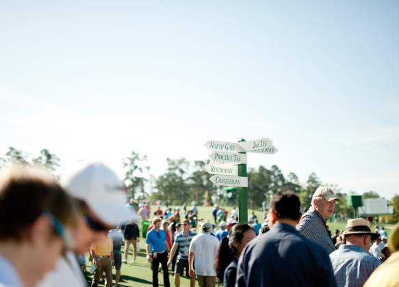 Crowd by Directional Sign | Masters