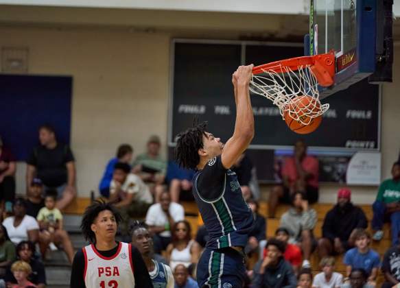 Nike EYBL Peach Jam - Youth Dunking a Basketball