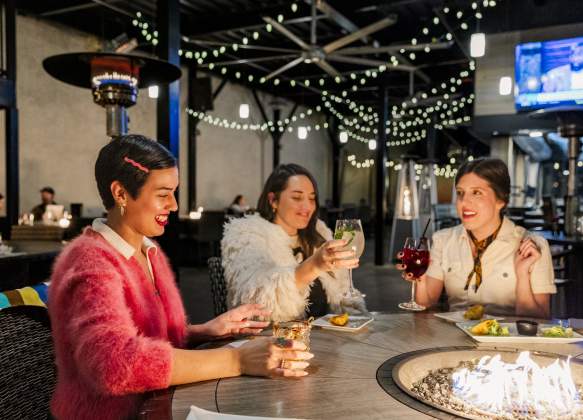 Women Drinking Cocktails at Sole Augusta in Downtown