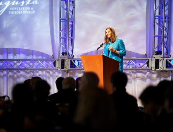 Lady Speaker at a Meeting