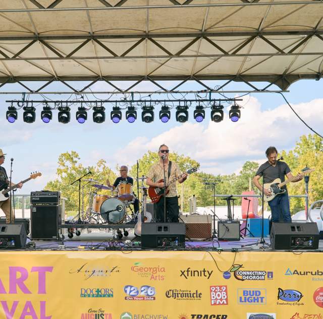 Male Band Performing on Stage at Arts in the Heart Festival