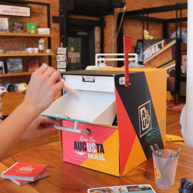 Submitting Downtown Augusta Staycation Contest Entry in Augusta & Co.'s Mailbox
