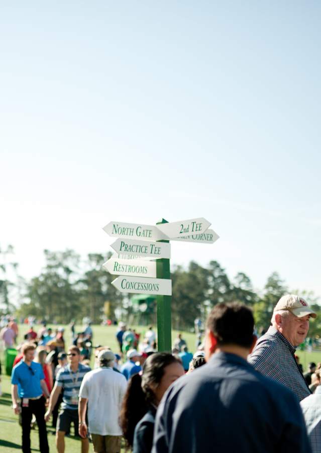 Crowd by Directional Sign | Masters
