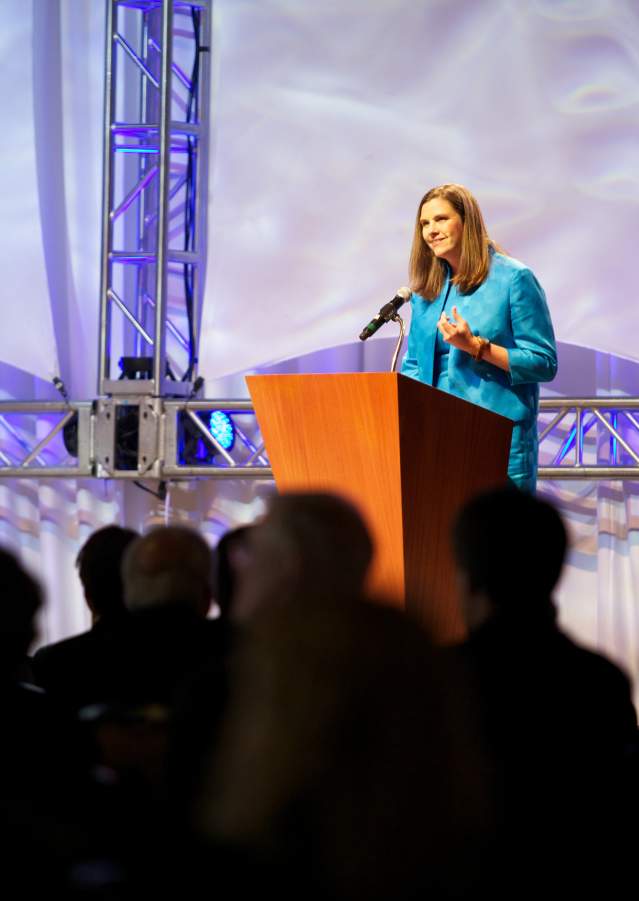 Lady Speaker at a Meeting