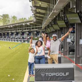 family at top golf