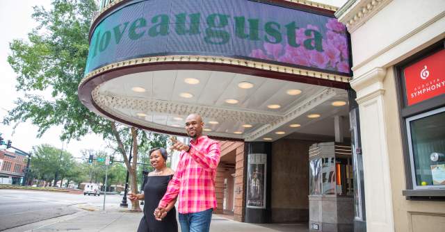 couple coming out of the theater
