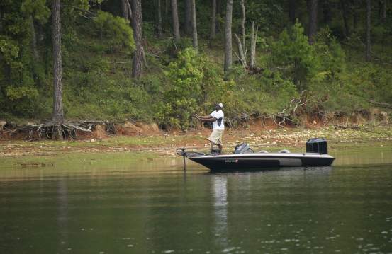 fishing from boat on lake