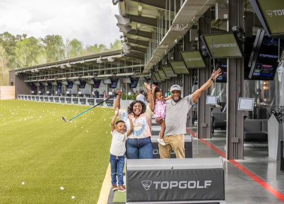 family at top golf