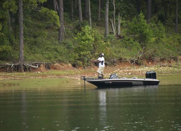 fishing from boat on lake