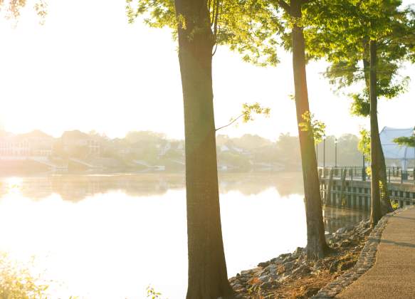 Man Jogging Along The Augusta Riverwalk