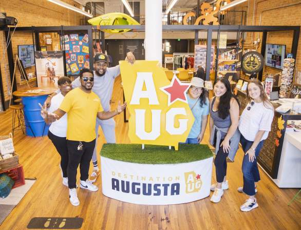 Augusta & Co. Pose with AUG Star Icon
