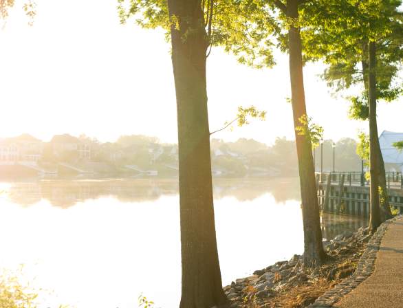 Man Jogging Along The Augusta Riverwalk