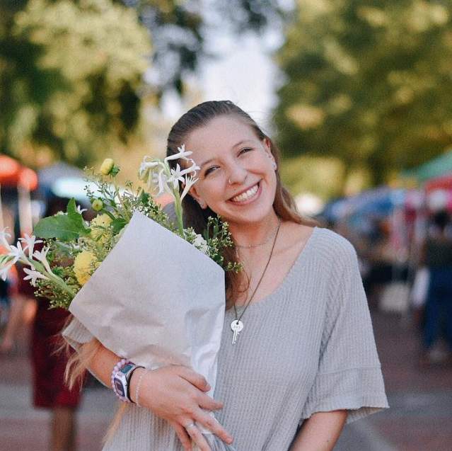 Girl at Saturday Market on the River
