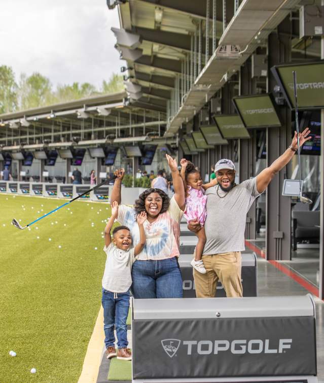 family at top golf