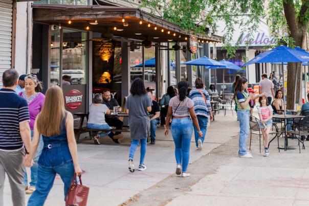 Photo of people walking in Downtown Augusta on Broad Street.