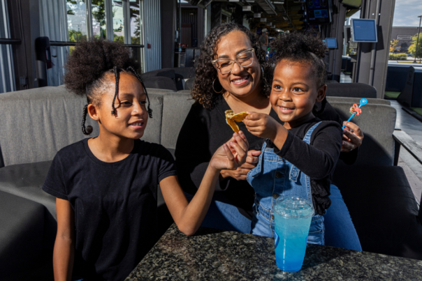 Brandy Mitchell and Family at Topgolf Augusta