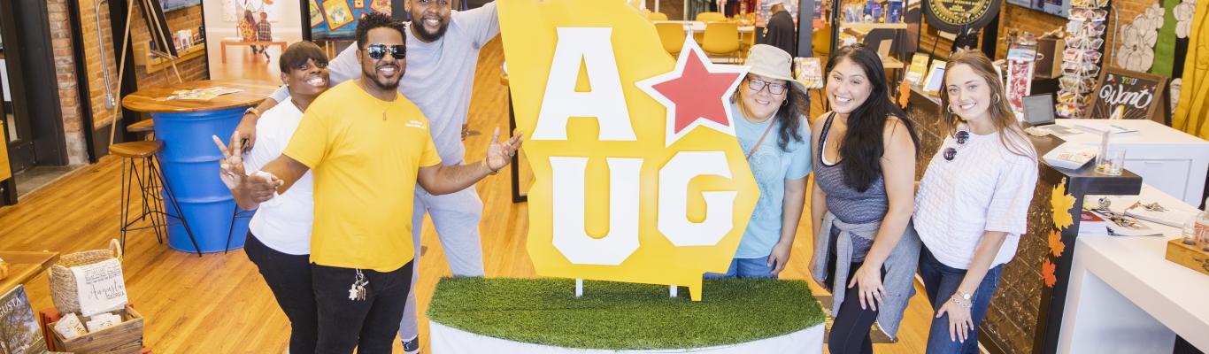 Augusta & Co. Pose with AUG Star Icon