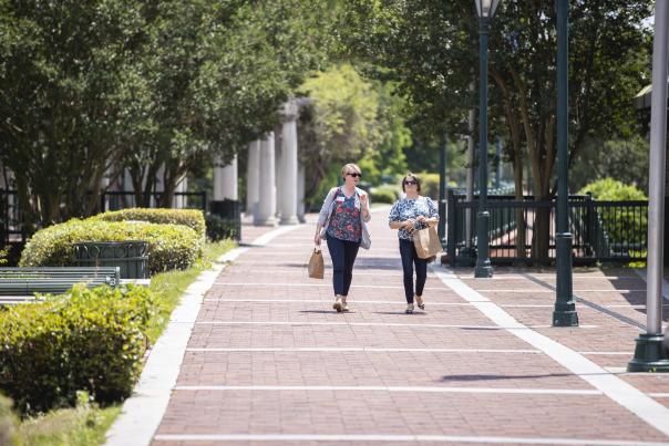 Ladies Walking Along The Augusta Riverwalk