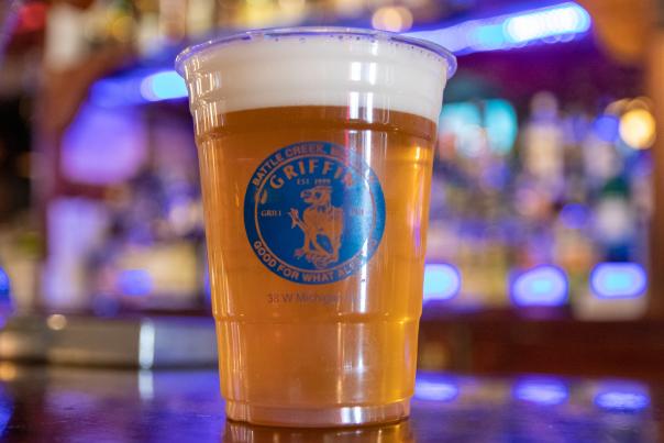 A beer in the official Social District cup.