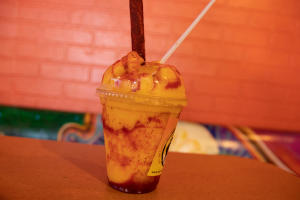 A street food flair, serving elote and paleta. Or try the mangonada, which is mango ice cream mixed with magic chili sauce, topped by fruit AND THEN they stick in a straw covered in spicy tamarind candy.