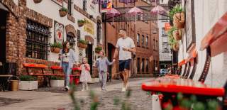 Family walking through Cathedral Quarter
