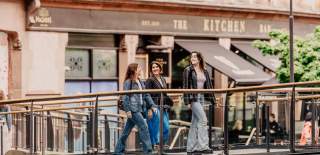 Group of girls walking through Victoria Square