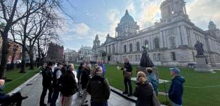 Group tour outside Belfast City Hall