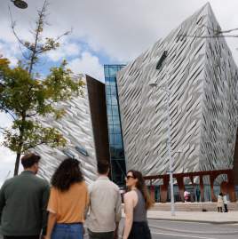 Group walking towards Titanic Belfast
