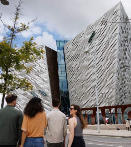 Group walking towards Titanic Belfast