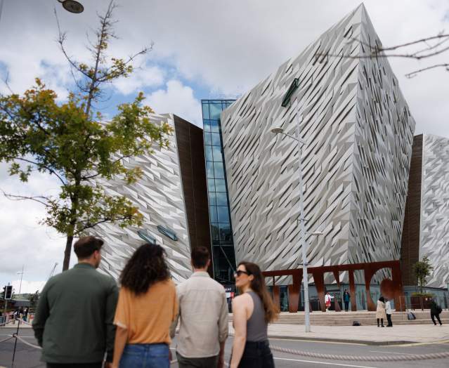 Group walking towards Titanic Belfast