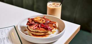 Stack of pancakes and iced latte at Neighbourhood Belfast