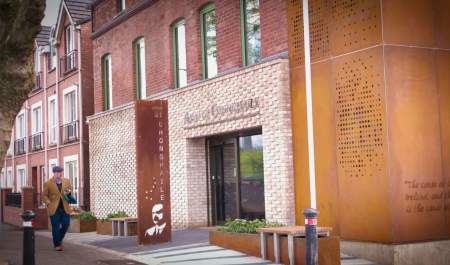 Man walking outside the James Connolly Visitor Centre.