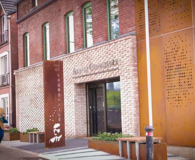 Man walking outside the James Connolly Visitor Centre.